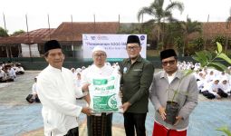 Hari Santri Nasional, Danone Indonesia-Serikat Ekonomi Pesantren Tanam 5.000 Bibit Pohon - JPNN.com