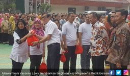 Yasonna Laoly Lepas Perjalanan Mudik Bersama Pegawai Kemenkumham - JPNN.com