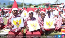 22.205 Siswa Papua Warnai Gambar Burung Garuda Pancasila - JPNN.com