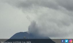 Abu Vulkanik Menutupi Bandara Ngurah Rai - JPNN.com