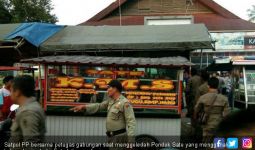 Pemilik dan Penjual Sate Padang Mengandung Daging Babi Jadi Tersangka - JPNN.com