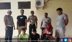 Polisi Berhasil Ringkus Dua Bandit Bersenpi Perampas Ponsel di Lampung - JPNN.com
