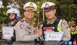 Horeeee! Dua Anggota Satlantas Berprestasi Dapat Hadiah Umrah - JPNN.com