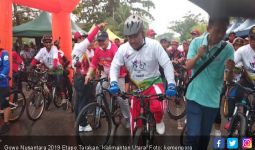 Hujan tak Surutkan Semangat Ribuan Pesepeda Ikuti Gowes Nusantara 2019 Etape Tarakan - JPNN.com