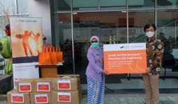 Hanwha Life Serahkan Donasi untuk Ringankan Warga saat Pandemi Covid-19 - JPNN.com