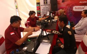 Kemenkumham Bali Mempermudah Akses Masyarakat Melalui Mobile IP Clinic, Apa Saja? - JPNN.com Bali