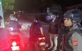 Pesan Berantai Bentrok Dua Kelompok Pemuda Beredar, Polisi Bersenjata Turun Gunung - JPNN.com Bali