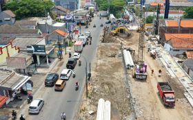 Proyek Pelebaran Jalan di Wiyung-Babatan Ditargetkan Rampung Desember 2024 - JPNN.com Jatim