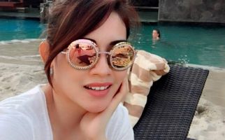 Asrhi Yuanita Haqie, Legislator Cantik yang Doyan Kunyah Bawang Putih - JPNN.com