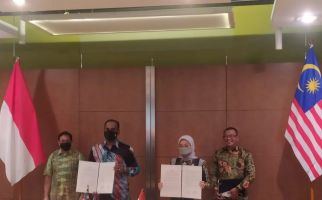 Indonesia-Malaysia Menjalin Kerja Sama Penempatan dan Perlindungan PMI - JPNN.com