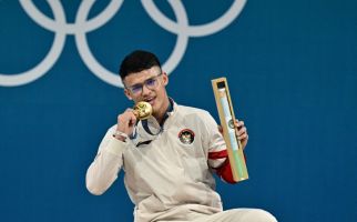 Profil Rizki Juniansyah, Cowok Banten Berkacamata si Peraih Emas Olimpiade Paris 2024 - JPNN.com