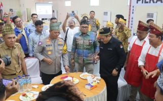 Ciptakan Pilkada Damai, Polisi Satukan Paslon Bupati Rohul Dalam Lomba Memasak - JPNN.com