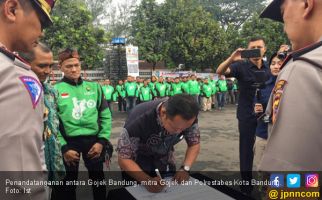 Tingkatkan Keamanan Berlalu Lintas, 400 Mitra Gojek Jadi Relawan Kamtibmas - JPNN.com