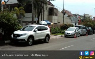 Petugas Gencar Sosialisasi Parkir Ganjil Genap - JPNN.com