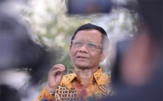 Pak Mahfud Pastikan Pemerintah Fokus Gunakan Pendekatan Kemanusiaan untuk Papua - JPNN.com