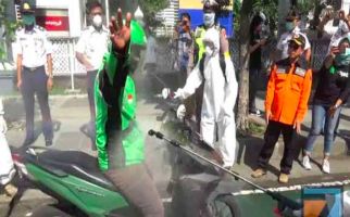 Ini Tiga Titik Penyemprotan Disinfektan untuk Driver Ojek Online - JPNN.com