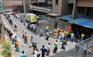 Singapura Kewalahan Melawan Virus Corona di Asrama Pekerja Migran - JPNN.com