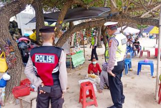 Covid-19 Kian Melonjak, Polisi Sisir Pantai Kuta Ingatkan Wisatawan taat Prokes - JPNN.com Bali