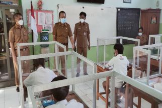 Disdik Wajibkan Orang Tua Siswa Suntik Vaksin, Ini yang Terjadi Jika Tolak Vaksinasi - JPNN.com Bali