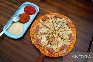 Nikmatnya Piza Andaliman dengan Cita Rasa Bumbu Khas Batak, Hanya Ada di Danau Toba - JPNN.com Sumut