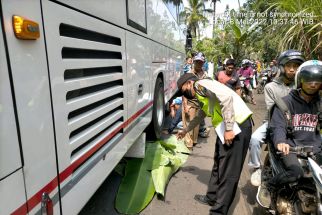 Pulang Wisata, Ujang Tewas Terlindas Bus Pariwisata di Malang - JPNN.com Jatim