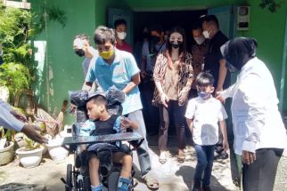 Mensos Risma Ajak Jan Ethes Beri Bantuan Anak Cerebral Palsy di Solo - JPNN.com Jateng