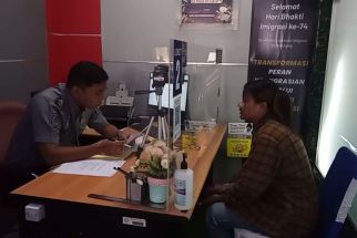 Imbas Gangguan Pusat Data Nasional, 400 Berkas Pemohon Paspor di Madiun Tertunda - JPNN.com Jatim