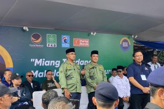 Makna Mendalam dari Baju Hansip Farhan – Erwin Saat Deklarasi Maju Pilwalkot Bandung 2024 - JPNN.com Jabar