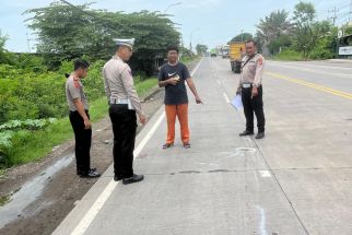 Diduga Selip Saat Menyalip, Pemuda Asal Bojonegoro Tewas Tertemper Bodi Truk - JPNN.com Jatim