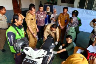 Gojek & Disnaker Jatim Luncurkan Program K3 untuk Mitra Driver Ojol - JPNN.com Jatim