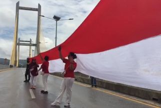 JTK Menjadi Tempat Pengibaran Bendera Merah Putih Sepanjang 770 Meter - JPNN.com Sultra