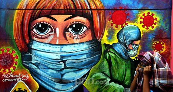 Pakai Mural untuk Ingatkan Warga akan Bahaya Covid-19 - JPNN.com