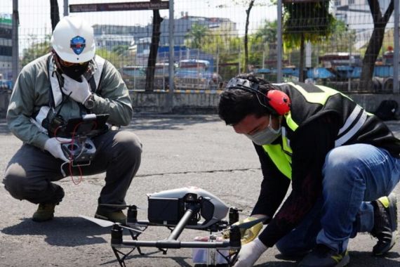 Teknologi Drone Digunakan untuk Menyalurkan Bantuan kepada Pasien COVID-19 di Makassar - JPNN.COM