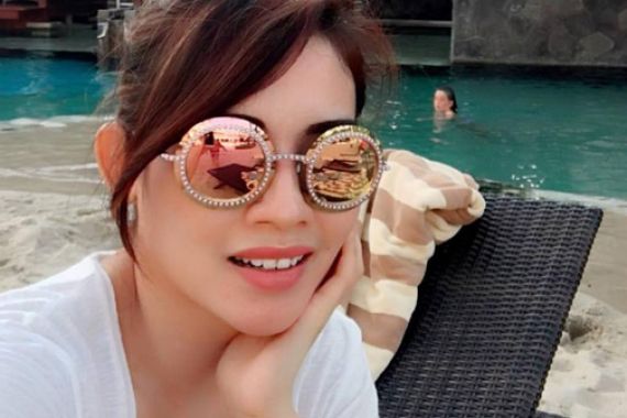 Asrhi Yuanita Haqie, Legislator Cantik yang Doyan Kunyah Bawang Putih - JPNN.COM