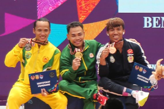 Lifter Olimpiade Berjaya di Cabor Angkat Besi PON XX Papua - JPNN.COM