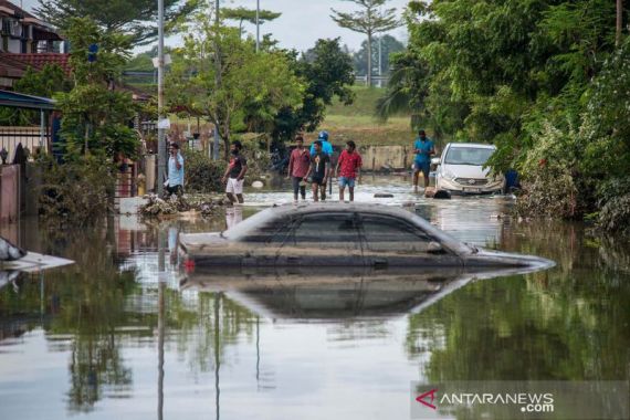 Pekerja Migran Indonesia Tuai Apresiasi, Bantu Para Korban Banjir di Malaysia - JPNN.COM