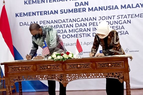 Indonesia-Malaysia Teken MoU, Gaji Pekerja Migran Indonesia Kini Minimal Rp 5,2 Juta - JPNN.COM