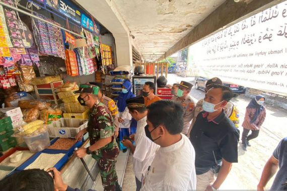 AKBP Hery Purnomo Peringatkan Pedagang Minyak Goreng Curah di Jember - JPNN.COM
