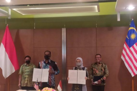 Indonesia-Malaysia Menjalin Kerja Sama Penempatan dan Perlindungan PMI - JPNN.COM