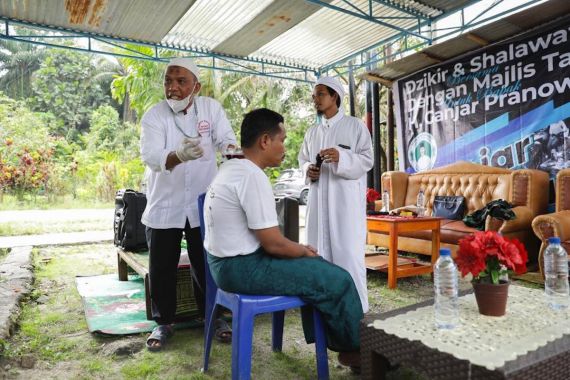 TGS Ganjar Ajak Masyarakat Simalungun Terus Jaga Kesehatan - JPNN.COM