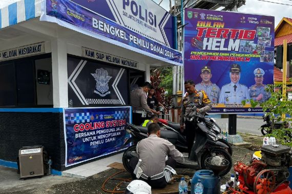 Polres Inhu Buka Bengkel Pemilu Damai, Sediakan Servis Gratis Bagi Pemudik Nataru - JPNN.COM