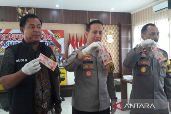 Menjelang Tahun Baru Alwani dan Afandi Edarkan Uang Palsu - JPNN.COM