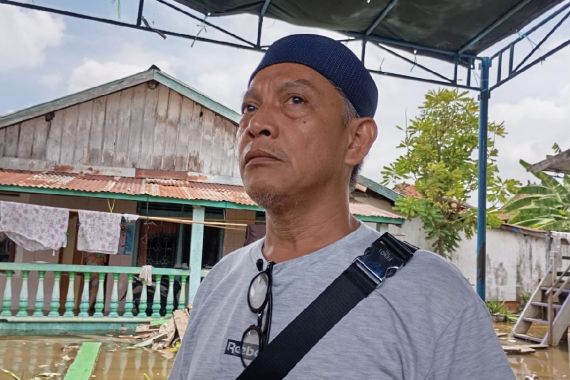 Menjelang Hari Pencoblosan Pemilu, TPS di Tangga Buntung Palembang Terendam Banjir - JPNN.COM