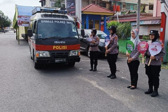 Kapolres Inhu dan Anak Buahnya Keliling Kota Rengat, Ajak Masyarakat Jangan Golput - JPNN.COM