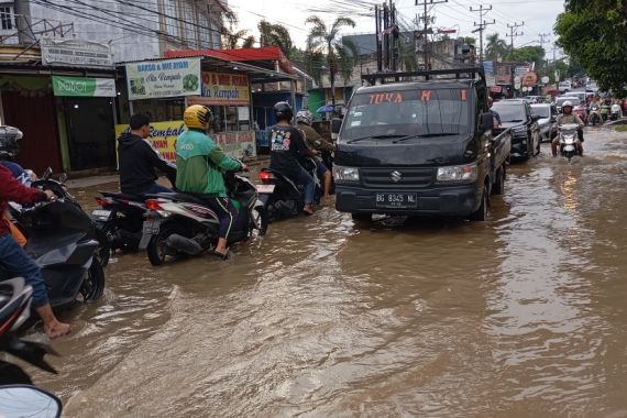 Palembang Dikepung Banjir, Bagaimana dengan TPS? - JPNN.COM