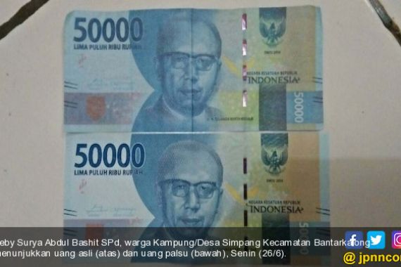 Dapat Angpao saat Lebaran, Warga Tasikmalaya Temukan Uang Baru Palsu - JPNN.COM