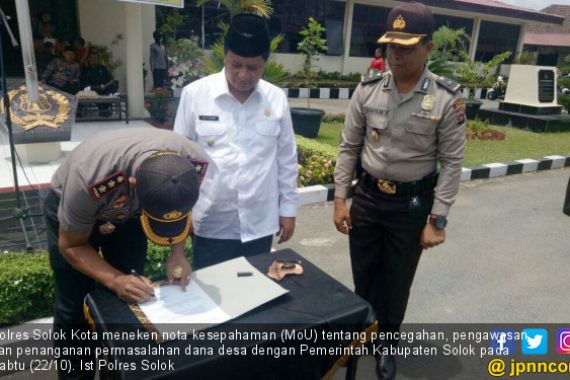 Polres Solok Teken MoU Pengawasan Dana Desa - JPNN.COM