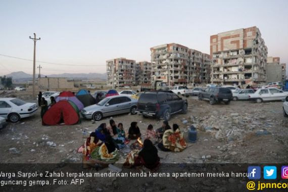 Gempa Robohkan Ribuan Apartemen, Rouhani Sindir Ahmadinejad - JPNN.COM