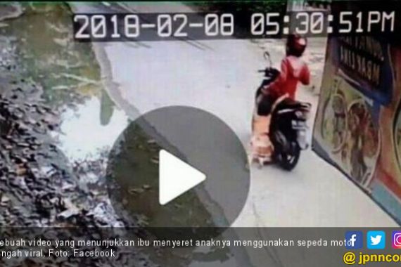 Ibu Seret Anak Ratusan Meter Menggunakan Sepeda Motor - JPNN.COM