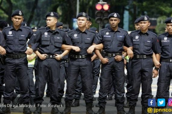 Tak Main-Main, Pemerintah Malaysia Kerahkan 55 Ribu Polisi Awasi Warga selama 14 Hari - JPNN.COM